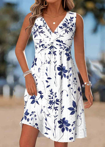 Tilly - Blomstret A-formet kjole med twist-detalje foran