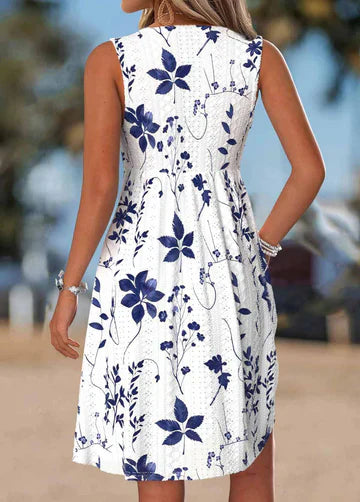Tilly - Blomstret A-formet kjole med twist-detalje foran